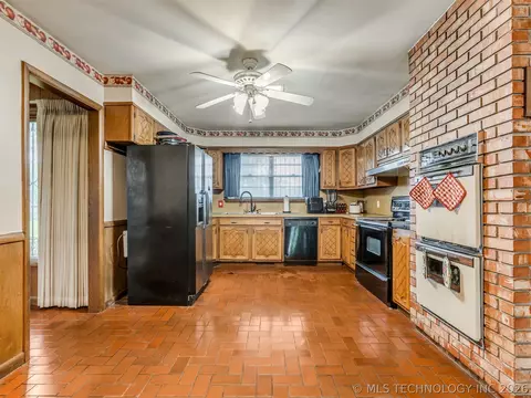 Kitchen - 1201 E 4th St, Okmulgee, OK 74447 photo 1 of 5