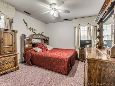 Bedroom - 1201 E 4th St, Okmulgee, OK 74447 photo 5 of 9