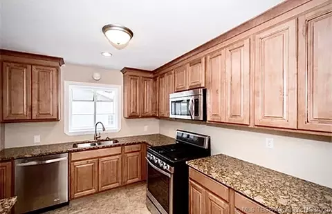 Kitchen - 5813 E 20th St, Tulsa, OK 74112 photo 2 of 3