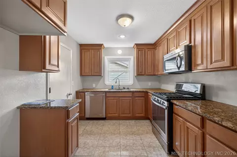 Kitchen - 5813 E 20th St, Tulsa, OK 74112 photo 1 of 3