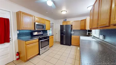 Kitchen - 1535 E 54th St, Tulsa, OK 74105 photo 2 of 3