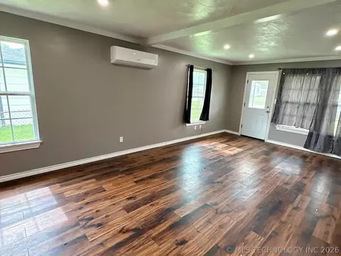 Living - 410 E 2nd St, Stroud, OK 74079 photo 1 of 7