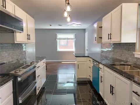 Kitchen - 6604 E 26th Ct, Tulsa, OK 74129 photo 2 of 4