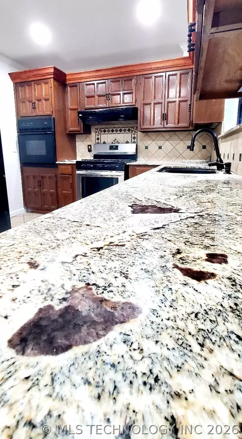 Kitchen - 9131 E 17th St, Tulsa, OK 74112 photo 2 of 3