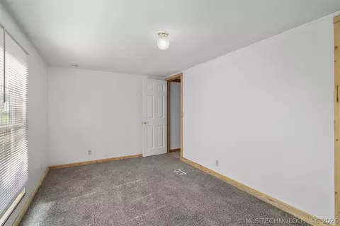 Bedroom - 215 E Florida, Durant, OK 74701 photo 6 of 10