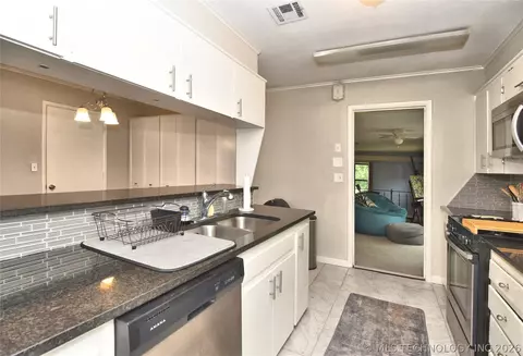 Kitchen - 7423 E 30th St, Tulsa, OK 74129 photo 1 of 3
