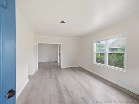 Living - 545 E Young St, Tulsa, OK 74106 photo 1 of 4