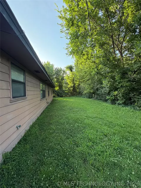 Exterior - 215 NE 7th St, Checotah, OK 74426 photo 5 of 5