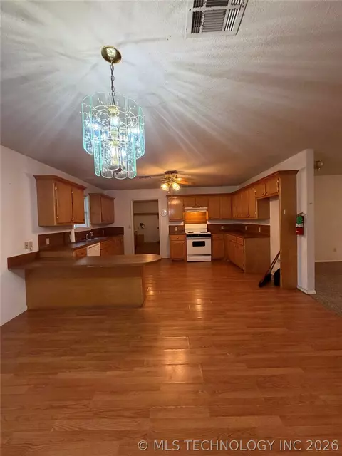 Kitchen - 215 NE 7th St, Checotah, OK 74426 photo 1 of 2