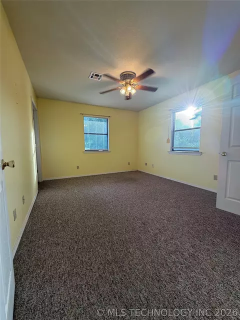 Bedroom - 215 NE 7th St, Checotah, OK 74426 photo 3 of 3