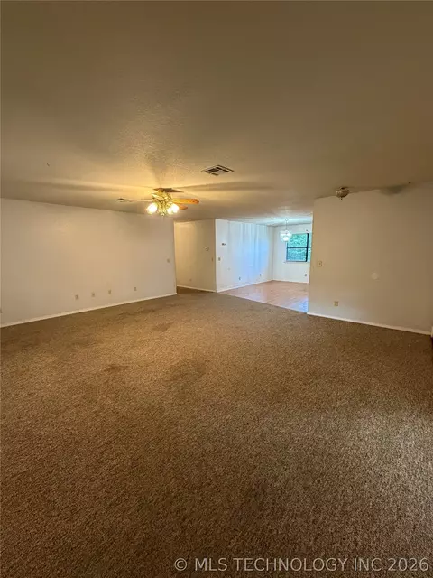 Living - 215 NE 7th St, Checotah, OK 74426 photo 1 of 2