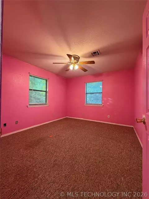 Bedroom - 215 NE 7th St, Checotah, OK 74426 photo 1 of 3