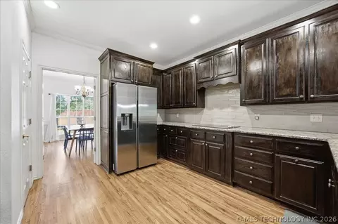 Kitchen - 8840 E 96th St, Tulsa, OK 74133 photo 2 of 5
