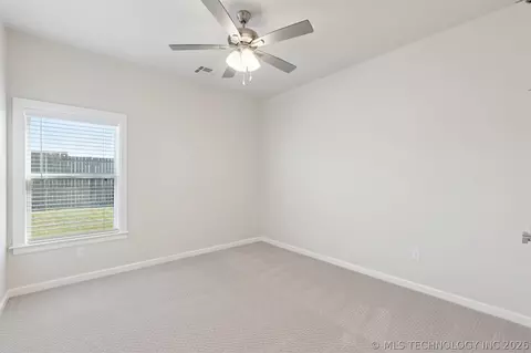 Bedroom - 754 E 149th St S, Glenpool, OK 74033 photo 11 of 13