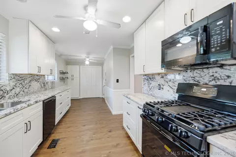 Kitchen - 5174 E 29th St, Tulsa, OK 74114 photo 1 of 3