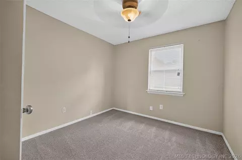 Bedroom - 458 E 137th St, Glenpool, OK 74033 photo 4 of 6