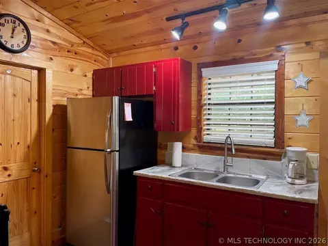 Kitchen - 609 Canoe Rd, Broken Bow, OK 74728 photo 2 of 2