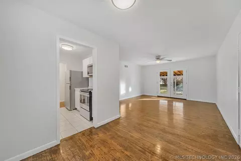 Living - 8928 E 4th St, Tulsa, OK 74112 photo 2 of 2