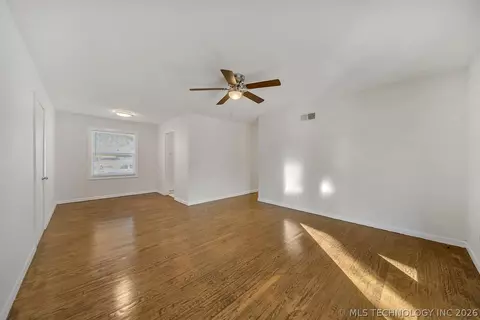 Living - 8928 E 4th St, Tulsa, OK 74112 photo 1 of 2