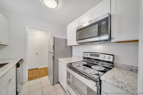 Kitchen - 8928 E 4th St, Tulsa, OK 74112 photo 2 of 3