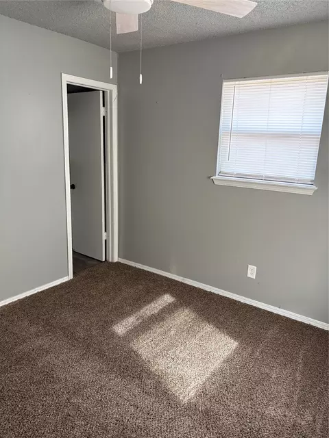 Bedroom - 1001 E Pecan St, Cushing, OK 74023 photo 1 of 4
