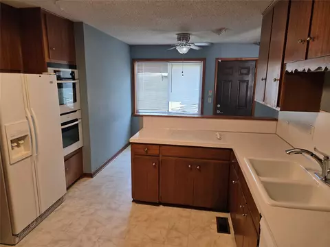 Kitchen - 10946 E 4th St, Tulsa, OK 74128 photo 1 of 2