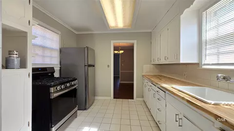 Kitchen - 2446 E 3rd St, Tulsa, OK 74104 photo 1 of 2