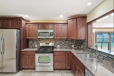 Kitchen - 1614 E 41st St, Tulsa, OK 74105 photo 2 of 3
