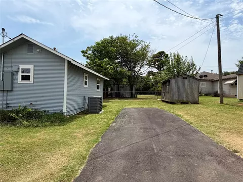 Exterior - 307 N Hartman Ave, Cushing, OK 74023 photo 5 of 13