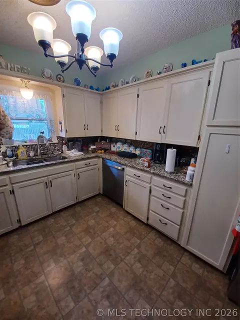 Kitchen - 722 SW 4th St, Checotah, OK 74426 photo 1 of 4