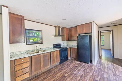 Kitchen - 228 E 9th Ave, Ada, OK 74820 photo 2 of 2