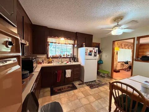 Kitchen - 11426 E 4th Pl, Tulsa, OK 74128 photo 1 of 2
