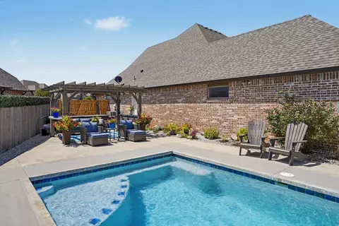 Exterior - 7703 E 81st Pl N, Owasso, OK 74055 photo 9 of 10