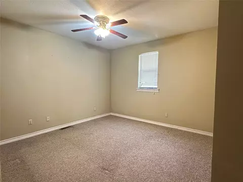 Bedroom - 1123 E 9th St, Okmulgee, OK 74447 photo 2 of 3