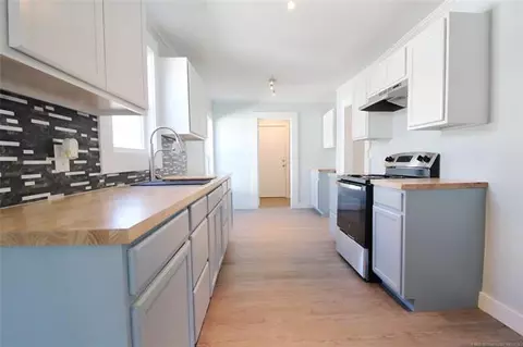 Kitchen - 907 E 3rd St, Okmulgee, OK 74447 photo 1 of 3