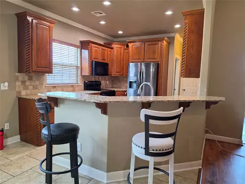 Kitchen - 823 Cypress Dr, Ada, OK 74820 photo 3 of 3
