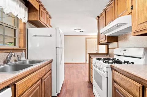 Kitchen - 212 Duncan Ave, Checotah, OK 74426 photo 2 of 2