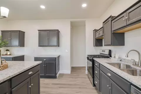 Kitchen - 502 N Broadway St, Checotah, OK 74426 photo 8 of 9