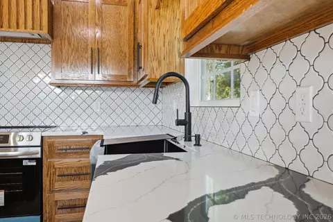 Kitchen - 5321 Tecumseh St, Tulsa, OK 74115 photo 3 of 5