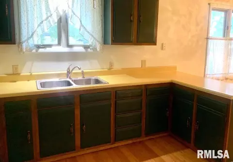 Kitchen - 411 E Teak St, Thayer, IL 62689 photo 3 of 3