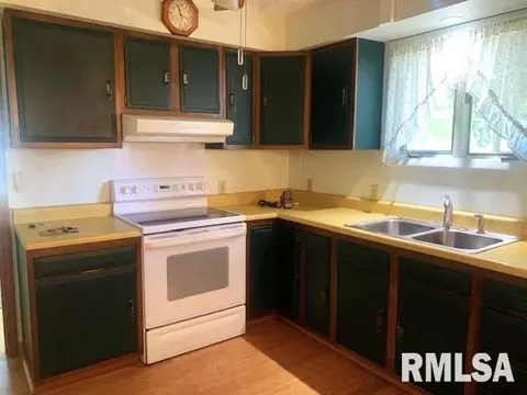 Kitchen - 411 E Teak St, Thayer, IL 62689 photo 2 of 3