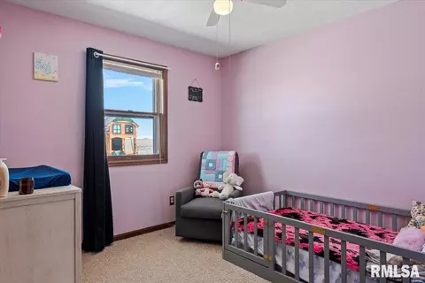 Bedroom - 406 S Main St, Ohlman, IL 62076 photo 5 of 6