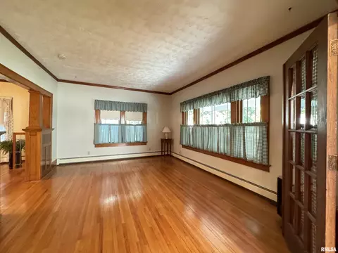Living - 323 E Cortland St, Avon, IL 61415 photo 1 of 13