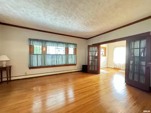 Living - 323 E Cortland St, Avon, IL 61415 photo 4 of 13