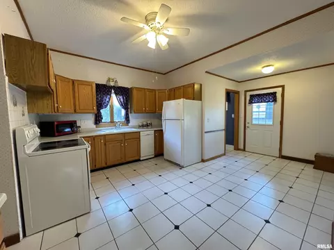 Kitchen - 323 E Cortland St, Avon, IL 61415 photo 1 of 2