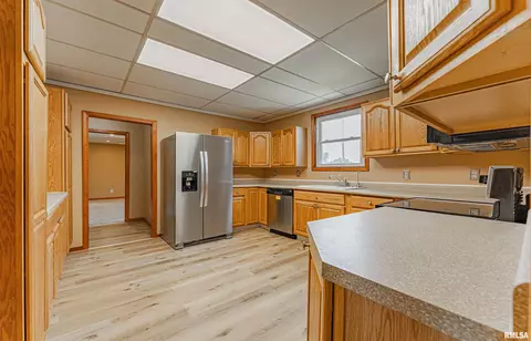 Kitchen - 205 E Pine St, Broadwell, IL 62634 photo 1 of 2