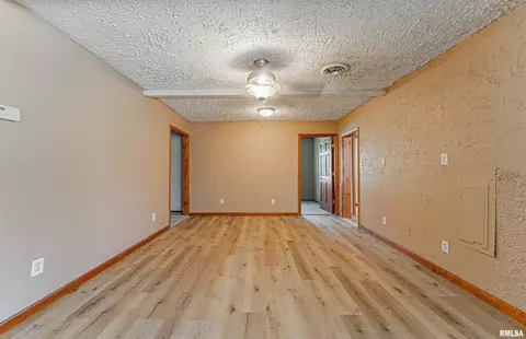 Living - 205 E Pine St, Broadwell, IL 62634 photo 4 of 5