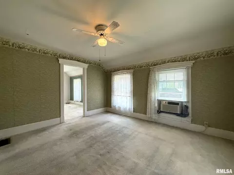 Bedroom - 124 S Joy St, Oneida, IL 61467 photo 3 of 13