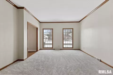 Living - 6401 Raintree Pl, Springfield, IL 62712 photo 2 of 11