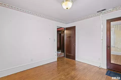 Bedroom - 207 E Cherokee St, Morrisonville, IL 62546 photo 5 of 9